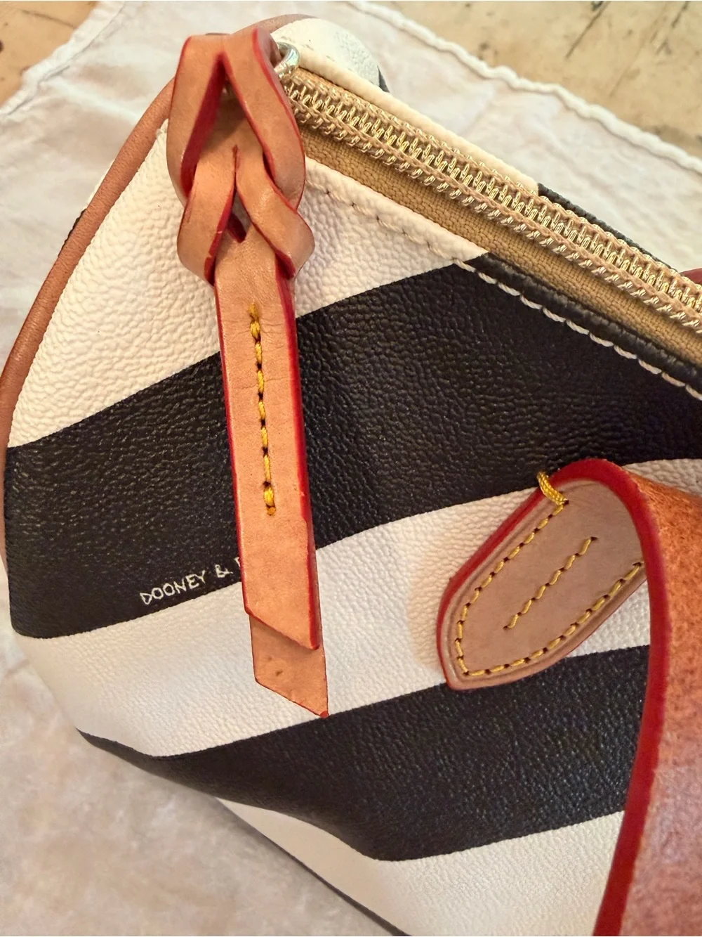 Dooney & Bourke Black and White Chevron Satchel with Red Accented Handles